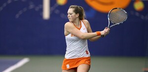 Gabriella Knutson fell behind in the first set of her singles matched but roared back to win the next two easily. 